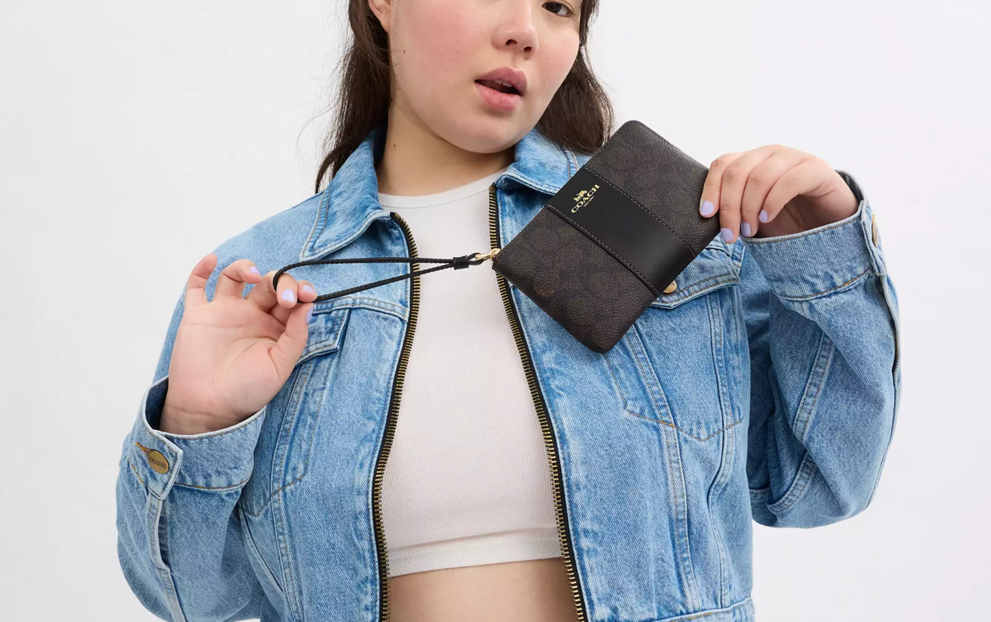 Coach Corner Zip Wristlet In Signature Canvas With Stripe