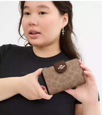 Coach Medium Corner Zip Wallet In Signature Canvas