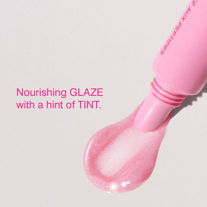 Rhode Peptide Lip Tint Nourishing Glaze - Jelly Bean - shimmery sheer baby pink + sweet pink jelly bean scent