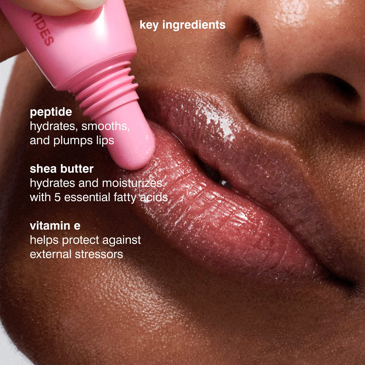 Rhode Peptide Lip Tint Nourishing Glaze - Jelly Bean - shimmery sheer baby pink + sweet pink jelly bean scent