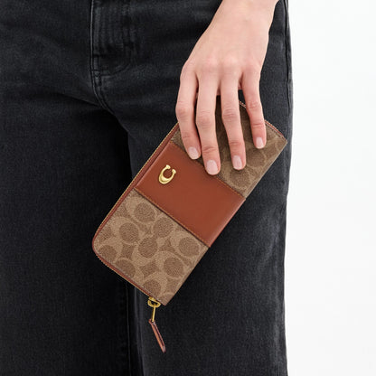 Coach Essential Slim Accordion Zip Wallet In Signature Canvas - Brass/Tan Caramel