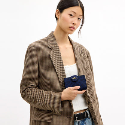 Coach Medium Corner Zip Wallet In Signature Canvas - Gold/Navy